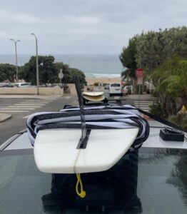 Getting ready to surf Manhattan Beach